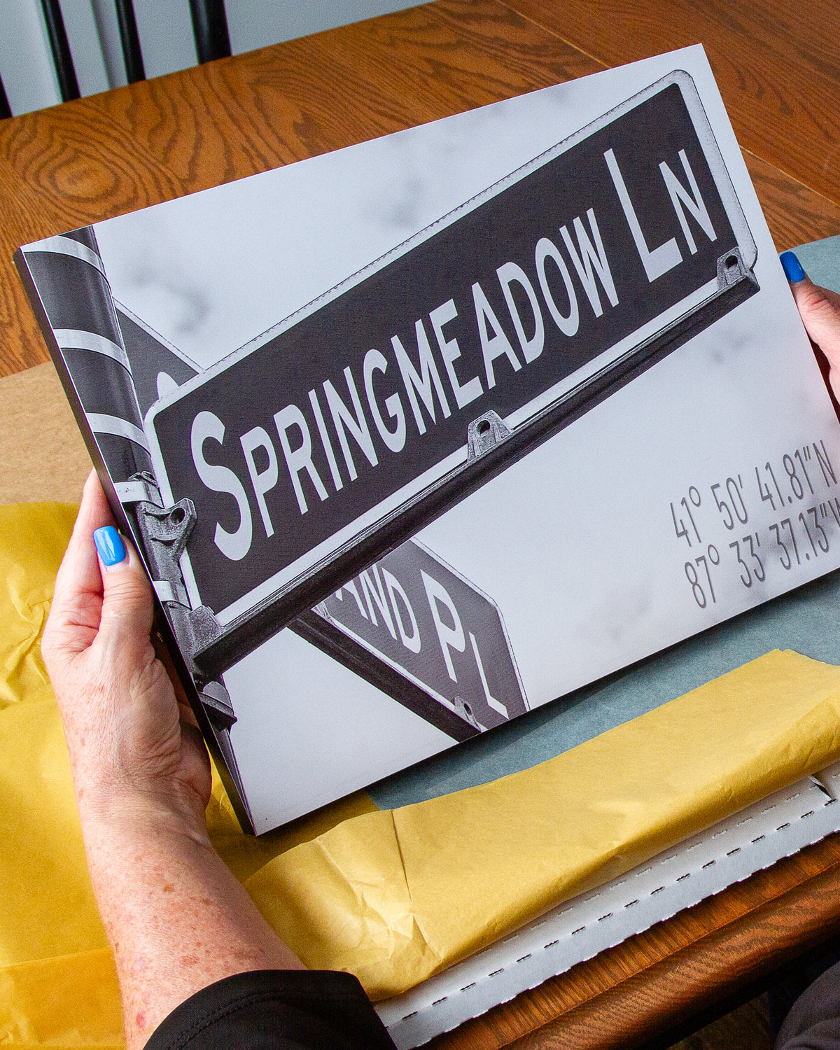 11x14 standout print being opened